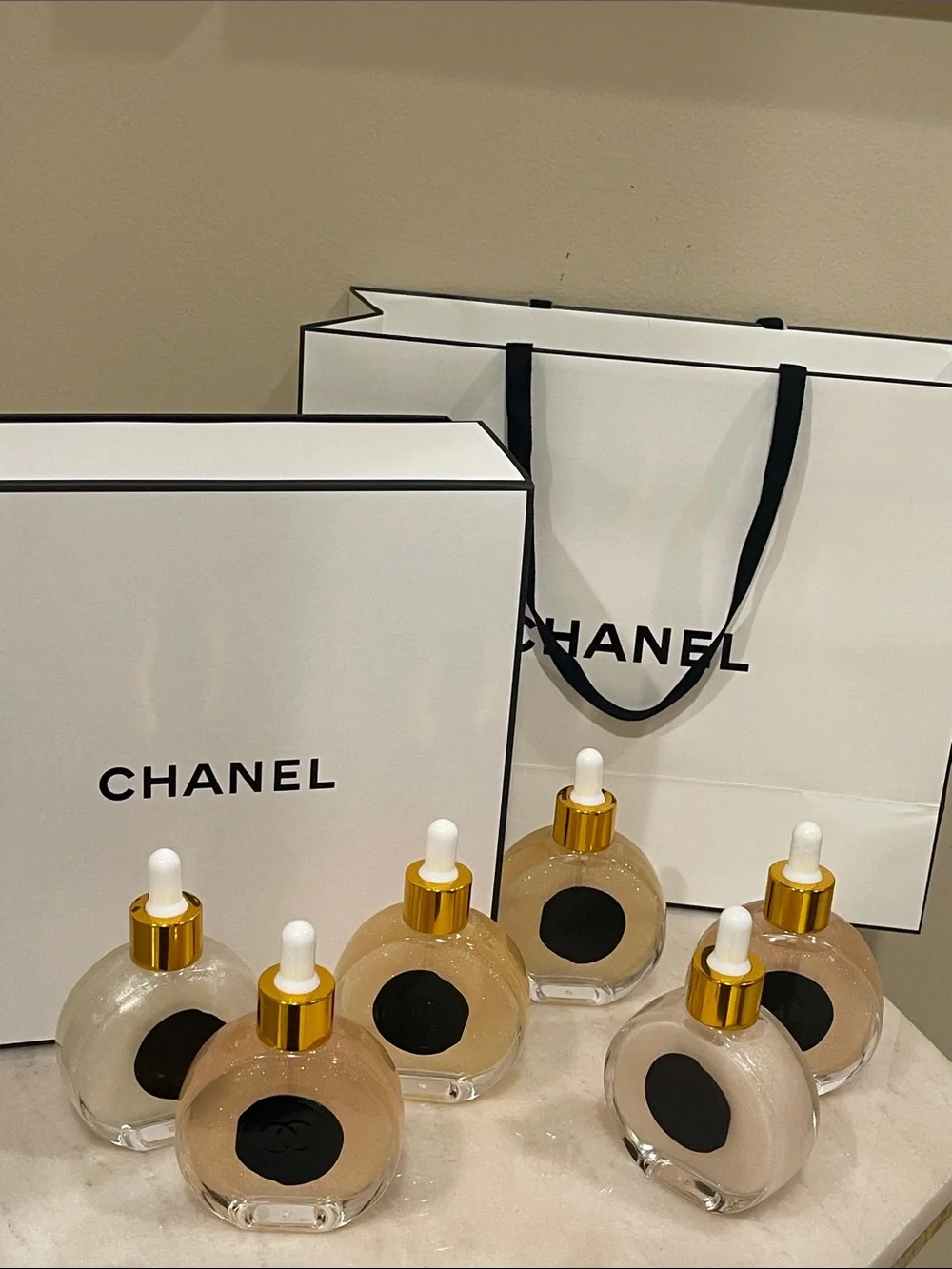 CHANEL Illuminating Shimmering Body Oil Fragrance Drop Bottles.